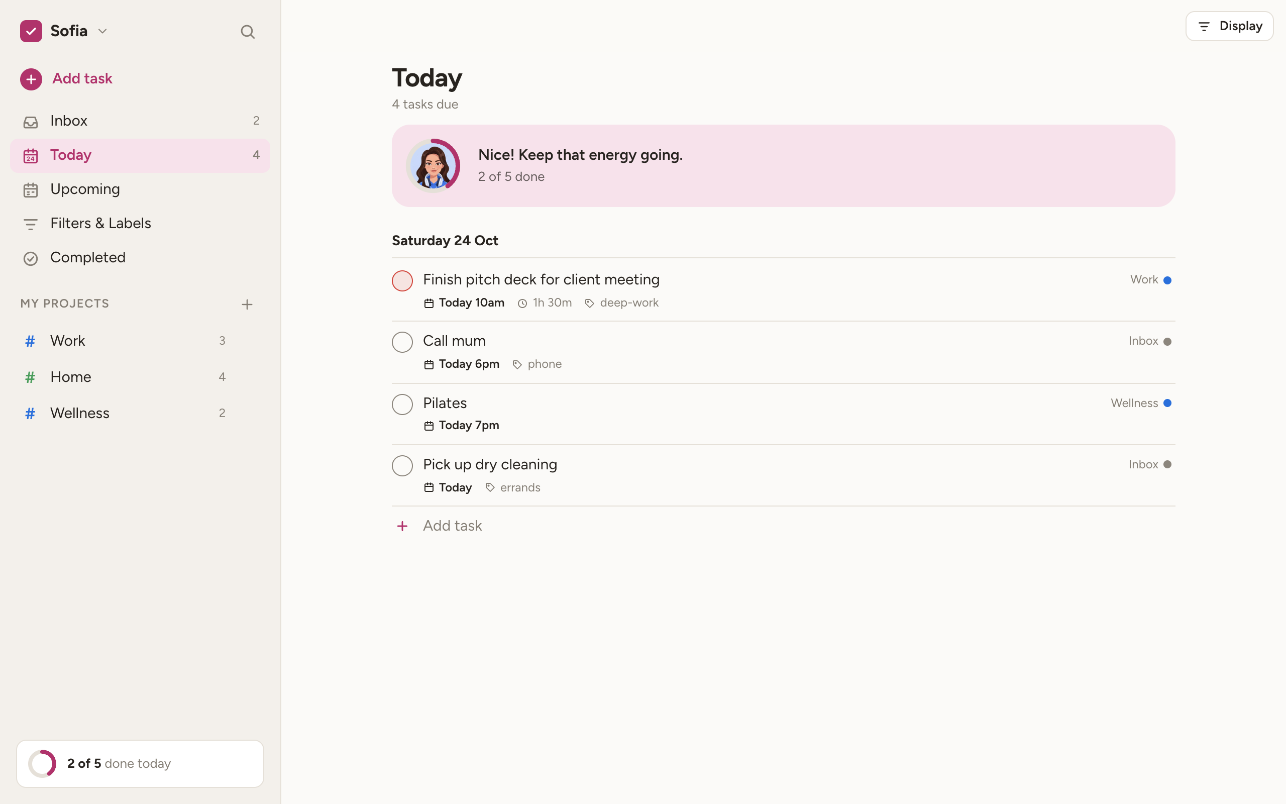 Taskly on a computer: the sidebar with projects, today’s list and the coach showing 2 of 5 tasks done.